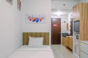 Simply and Homey Studio Transpark Cibubur Apartment By Travelio