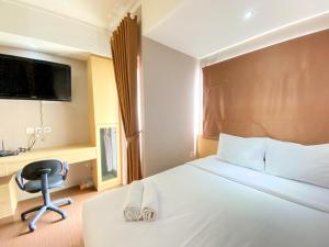 Cozy and Nice Studio at The Oasis Cikarang Apartment By Travelio