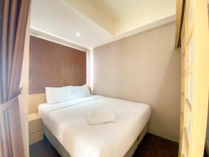 Cozy and Nice Studio at The Oasis Cikarang Apartment By Travelio