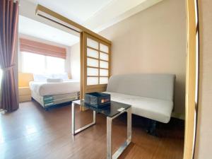 Cozy and Nice Studio at The Oasis Cikarang Apartment By Travelio