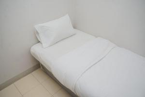 Comfort and Nice 2BR at Serpong Greenview Apartment By Travelio