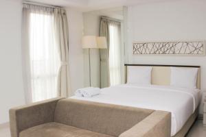 Nice and Comfy Studio Azalea Suites Apartment By Travelio