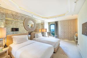 Deluxe Twin Room with Partial Sea View room in Wyndham Grand Istanbul Kalamış Marina Hotel