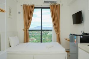 Nice and Minimalist Studio at Sky House BSD Apartment By Travelio