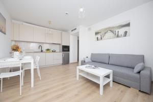 Pileckiego Apartments with Parking & Balcony by Noclegi Renters