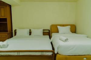 Spacious and Homey 3BR at Kondominium Rajawali Apartment By Travelio