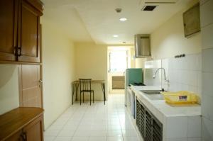 Spacious and Homey 3BR at Kondominium Rajawali Apartment By Travelio