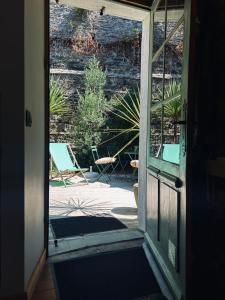 Maisons de vacances La Maison des Vignes - Terrasse & balcon : photos des chambres