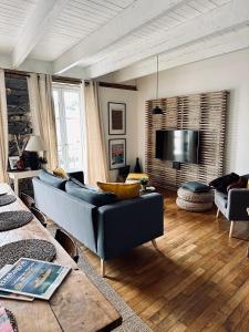 Maisons de vacances La Maison des Vignes - Terrasse & balcon : photos des chambres