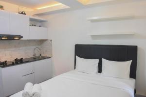 Comfort and Homey Studio at Amethyst Apartment By Travelio