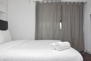 Comfort and Homey Studio at Amethyst Apartment By Travelio