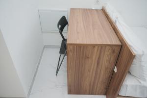 Studio Apartment at Sky House BSD with Cozy Design By Travelio