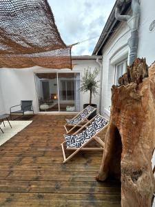Appartements News ! Loft Movie Station Champagne : photos des chambres