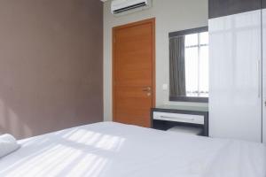 Vibrant Luxurious 2BR Apartment at Aryaduta Residence Connected to Cito Mall By Travelio