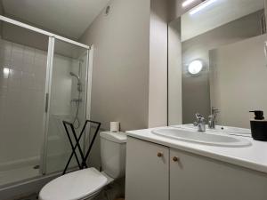 Appartements L-essentiel, studio tout equipe : photos des chambres