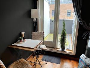 Large room & Balcony - i Heisens Condo - nearby Pulpit Rock Tours bus stop