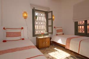 Riad Ptit Kech, Bassin terrasse - Petits déjeuners