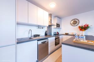 Appartements Le Cartier Appt F3, 7mn Disneyland, Parking,Terrace : photos des chambres