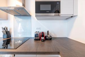 Appartements Le Cartier Appt F3, 7mn Disneyland, Parking,Terrace : photos des chambres