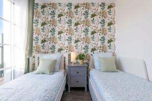 Appartements Le Cartier Appt F3, 7mn Disneyland, Parking,Terrace : photos des chambres