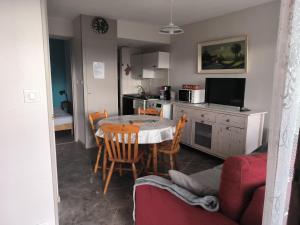 Appartements Charmant studio : photos des chambres