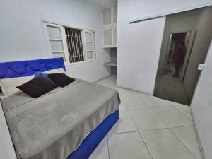 Casa com Piscina Cascata Na Praia Grande