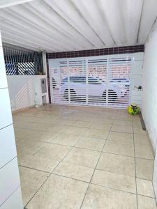 Casa com Piscina Cascata Na Praia Grande