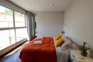 Casa amplia para 7 con garaje, parrilla y espacio de trabajo en zona residencial de Mendoza