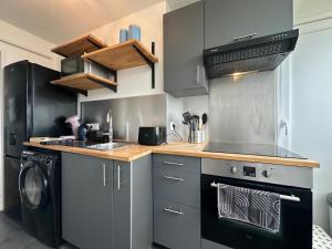 Appartements Le Jules Verne, proche de la Gare : photos des chambres