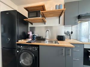 Appartements Le Jules Verne, proche de la Gare : photos des chambres