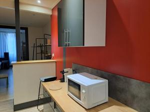 Appartements Les Arcades T1 La Lanterna 9 : photos des chambres