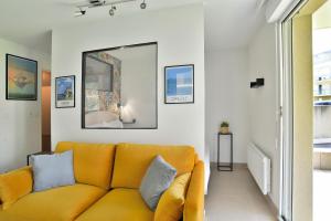 Appartements Escapade - Appartement avec jardin et parking : photos des chambres