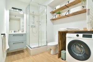 Appartements Escapade - Appartement avec jardin et parking : photos des chambres