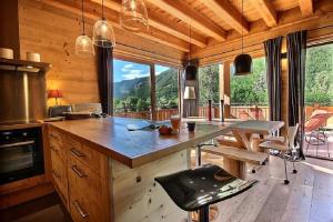 Chalet Prestige cheminée vue excep serrechevalierholidays