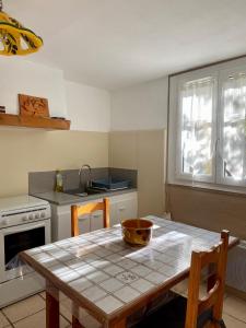 Appartements Le Micocoulier : photos des chambres