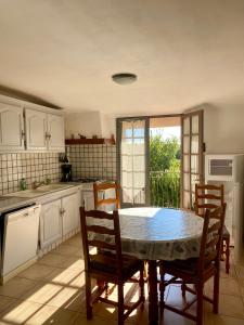 Appartements Le Micocoulier : photos des chambres