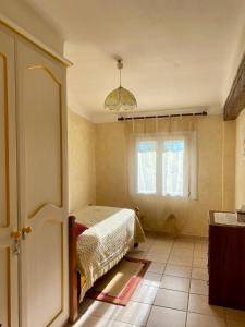 Appartements Le Micocoulier : photos des chambres