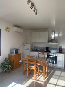 Appartements Le Micocoulier : photos des chambres