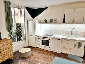 Appartements Joli deux pieces porte de Paris : photos des chambres
