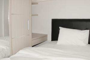 Comfort Living 3BR at Springlake Summarecon Bekasi Apartment By Travelio