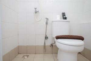 Homey and Comfort Living Studio Room at Bassura City Apartment By Travelio