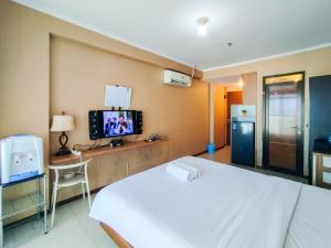 Spacious Chic Studio Room Apartment at Gateway Pasteur By Travelio