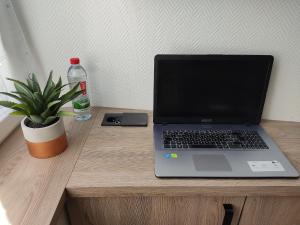 Appartements Appartement lumineux 4* pour 2 a Vittel, proche thermes, WiFi, parking gratuit - FR-1-589-745 : photos des chambres