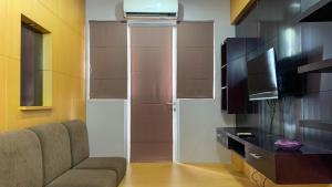 Comfort and Minimalist 2BR at Maple Park Sunter Apartment By Travelio