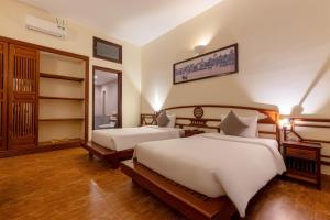 Phòng Superior 2 Giường Đơn Nhìn Ra Vườn (Superior Twin Room with Garden View)