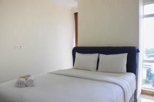 Spacious and Elegant 3BR at Menteng Park Apartment By Travelio