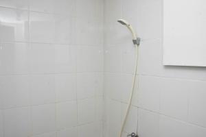 Comfortable 2BR Apartment at Bassura City By Travelio