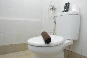 Comfortable 2BR Apartment at Bassura City By Travelio