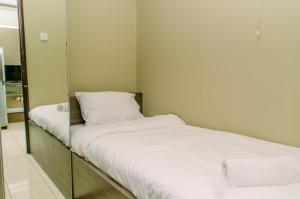 Nice and Elegant 2BR at Serpong Greenview Apartment By Travelio