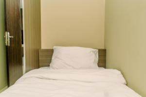 Nice and Elegant 2BR at Serpong Greenview Apartment By Travelio